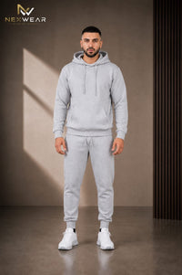 Solid pocket hoodie and drawstring bottom