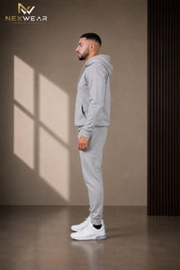 Solid pocket hoodie and drawstring bottom